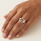 Dolphin heart ring worn on a hand, close-up