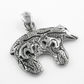 Textured sterling silver bear pendant with two raised bear motifs and a polished bail on white.
